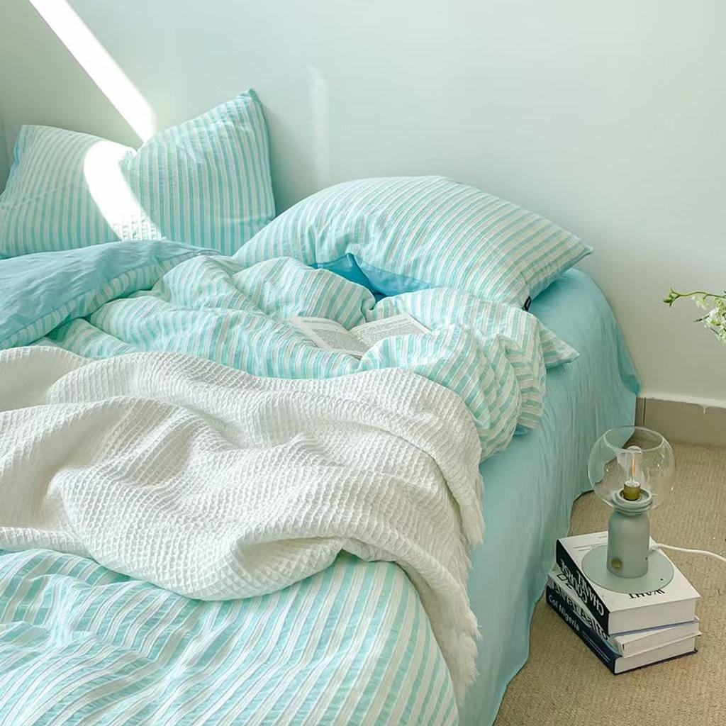 Refresh Jacquard Striped Bedding Set arranged on a bed